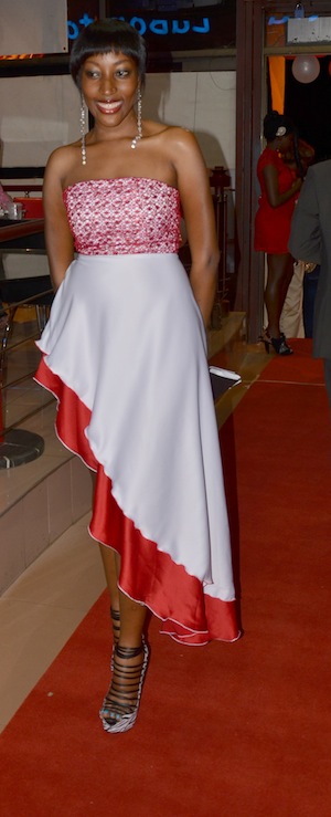 Tinah looks lavishing in a custom made dress 